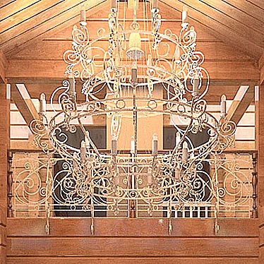 large cast iron chandelier and railings