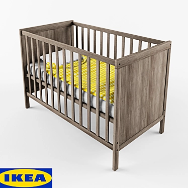 A baby bed and a chest of drawers from IKEA