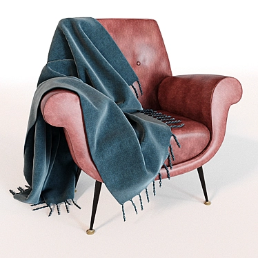 A leather chair with a blanket