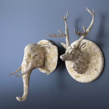 Wall sculpture. Deer head and marble elephant head